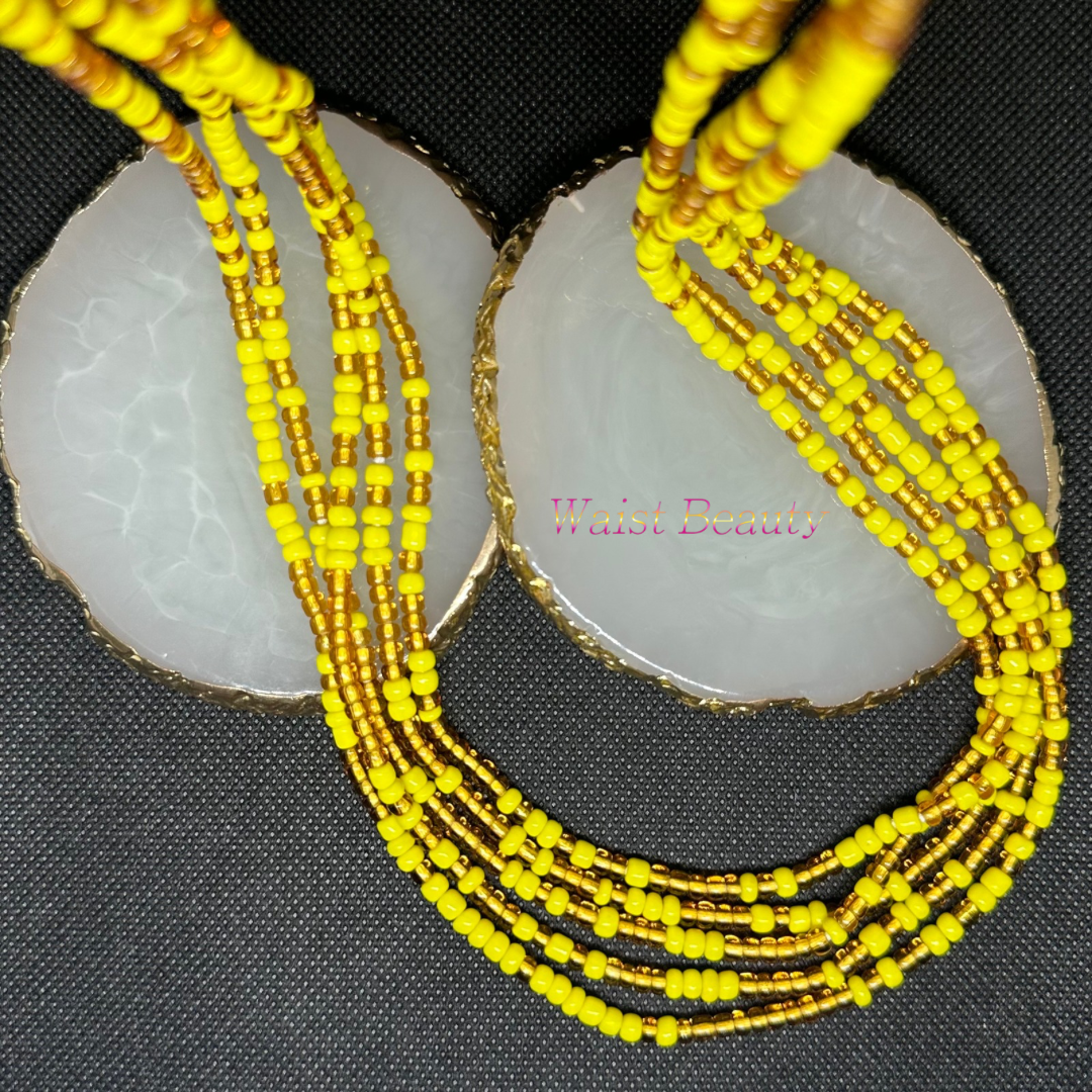 Gold and yellow tie-on waist bead from Waist Beauty, a stunning accessory to accentuate your unique style