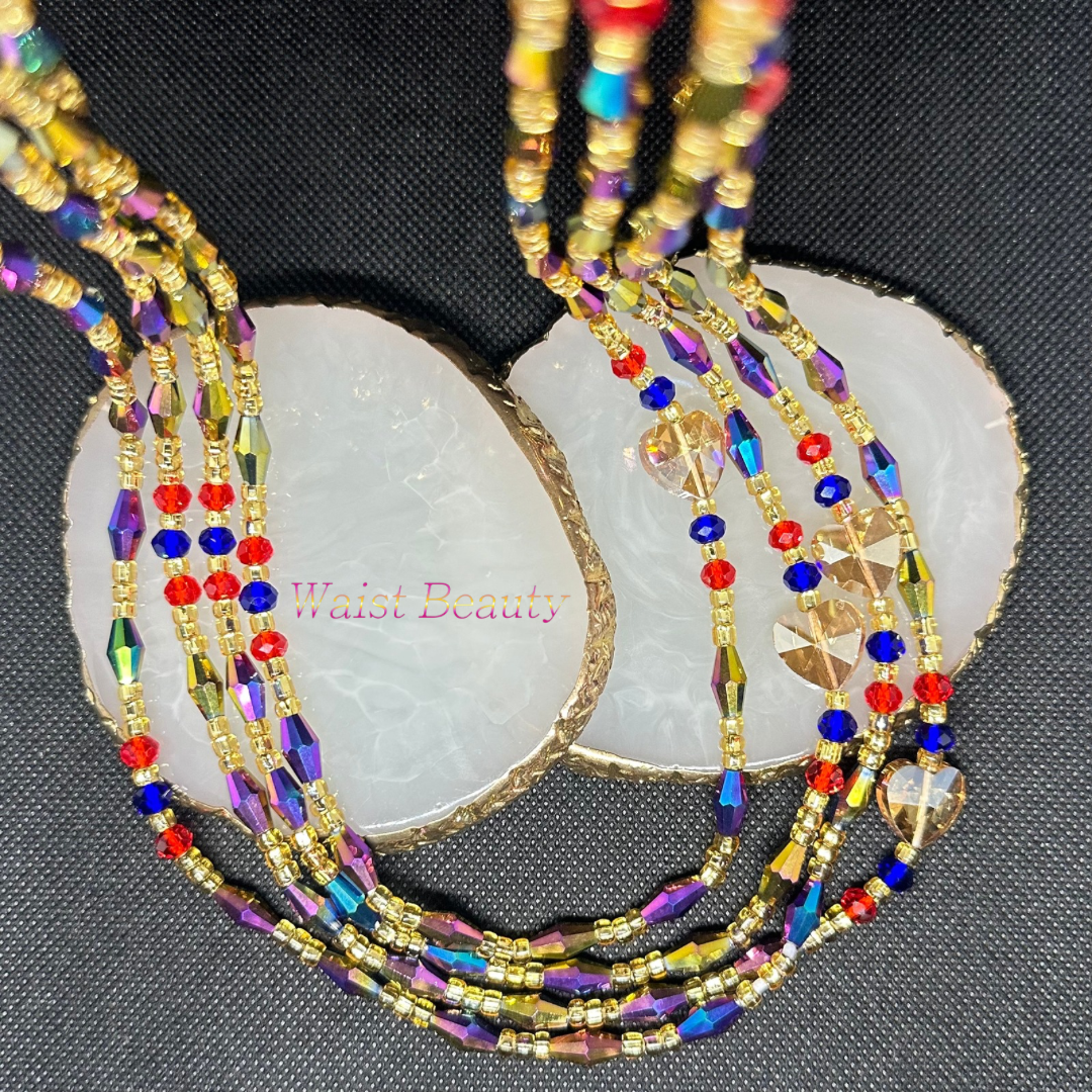 A stunning tie-on waist bead from Waist Beauty featuring a colorful combination of gold, purple, blue, and red beads.